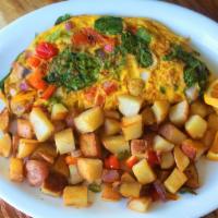 House Omelet · Free Range Eggs, spinach, mushrooms, bell pepper, tomatoes, onions, plant based cheese. Serv...