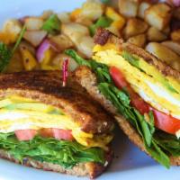Breakfast Sandwich · Fresh Basil, Tomato, Avocado, Egg, or organic Tofu, Plant Based Cheddar Cheese. Served with ...