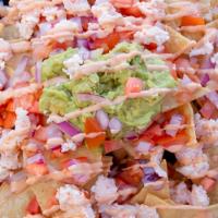 Sushi Nachos · our nachos come with, homemade tortilla chips, guacamole, salsa, with your choice of spicy t...