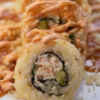 Crunchy Munchy · 8pc california roll, & sesame seeds in tempura, topped with crunchies & house sauces