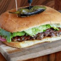 Torta · Mexican sandwich filled with your choice of meat, mayo, lettuce, tomatoes, avocado, jalapeño...