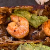 Taco Durango · Flour tortilla with cheese, Carne Asada grilled shrimp topped with Guacamole