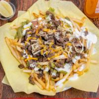 Super Fries · French Fries, topped with meat, refried beans, guacamole, cheese & sour cream.