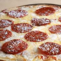 Classic Pepperoni Pizza · Organic tomato sauce, mozzarella, pepperoni.