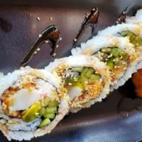 Crunch Scallop Roll · In - crunch scallop, crab meat, cucumber, avocado. Out - tempura crunch.