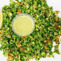 Tabbouleh Salad  · Bulgar salad mixed with chopped parsley , tomatoes, cucumbers, and onions.
