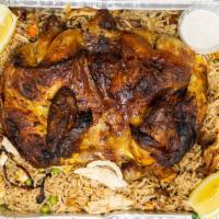 Rotisserie Chicken Plate · Rotisserie chicken served with your choice of biryani or yellow rice.