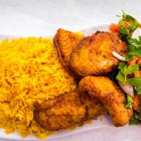 Fish Fillet Plate · Fish fillet served with yellow rice and salad.