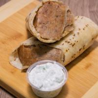 Gyros Wrap · Gyros wrap with tomatoes, onions, lettuce, and homemade sauce.