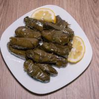 Dolma 15 Pc · Vegetarian cold appetizer rolled grape leaves.