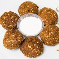 6 Pcs Falafel · Six pieces of falafel w/ a side of tahini sauce.