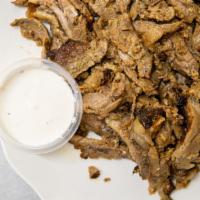 Beef Shawarma · One pound of beef shawarma w/ tahini sauce.