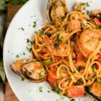 Linguini With Mixed Seafood · Linguine pasta, shrimp, clams, mussels, squid, seafood mix in your choice of tomato, cream o...