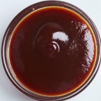 Side Of Bbq Sauce · Exquisite BBQ sauce.
