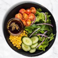 Pepper Salad · Cucumbers, cherry tomatoes, onions, and corn over mixed greens.