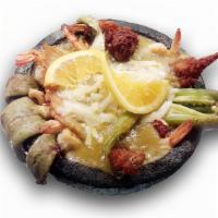 Molcajete De Mariscos · Seafood Molcajete
(Octopus, Crab, Shrimp, Fish and Chorizo)