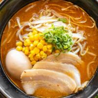 Spicy Miso Ramen · Based pork broth featuring flavorful fish dashi and spicy miso sliced pork chashu, scallion,...