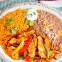 Chicken Fajita · Cooked with Mi Casa homemade sauce, vegetables, served with rice, beans and sour cream.