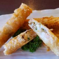 Shrimp Net Spring Roll · 4 pcs of shrimp net spring roll with sweet & tangy dipping sauce.