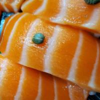 King Salmon Sushi · 2pc Sushi
**toppings may vary**.