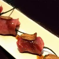 Bluefin Shishito · Spicy. Soy sauté shishito wrapped in bluefin tuna sashimi topped with garlic chips & balsami...