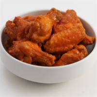 Traditional Wings (Fried)  · Big, meaty and swimming in sauce, for the traditionalist.