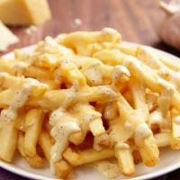 Parmesan Garlic Aioli Fries · Our natural cut fries topped with Garlic Aioli and shaved Parmesan cheese.