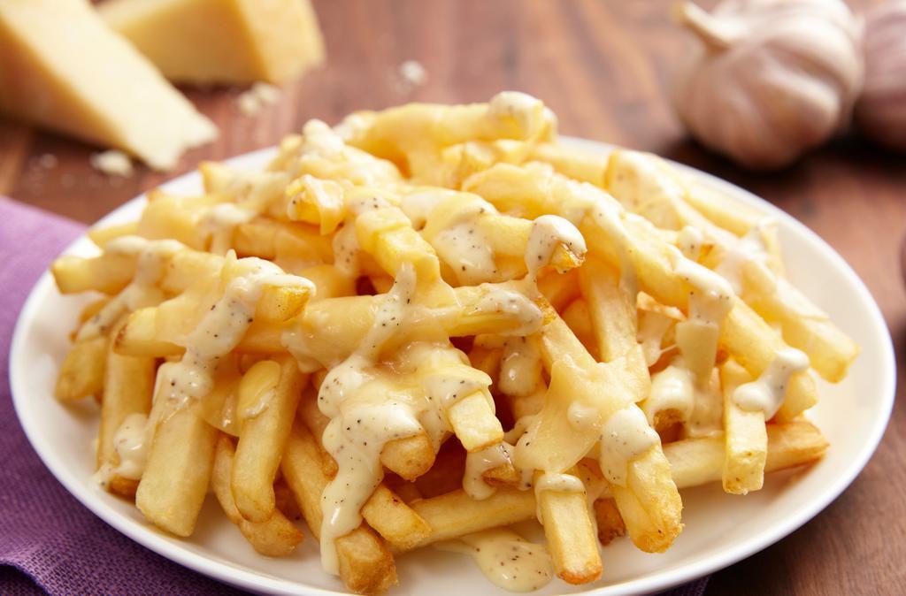 Parmesan Garlic Aioli Fries · Our natural cut fries topped with Garlic Aioli and shaved Parmesan cheese.