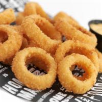 Onion Rings · Our thick cut, crumb-breaded rings, and served with 'Bama White BBQ' dipping sauce.