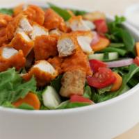 Buffalo Chicken Salad (Fried) · Fried Chicken tossed in Buffalo Medium sauce, assorted greens, shredded carrots, cucumbers, ...