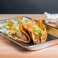 Two Hard Tacos Plate · Two hard tacos with your choice meat, lettuce and taco sauce served with rice and beans!