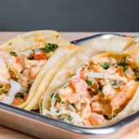 Two Shrimp Tacos Plate · Two shrimp tacos with cabbage, pico de gallo, chipotle crema and served with rice and beans.