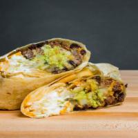 California Burrito · Flour tortilla with carne asada, french fries, cheddar and jack cheese, guacamole and sour c...