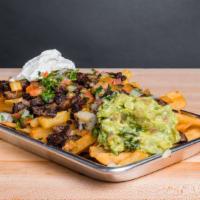 Carne Asada Fries · French fries with carne asada, cheddar and jack cheese, sour cream, guacamole and pico de ga...