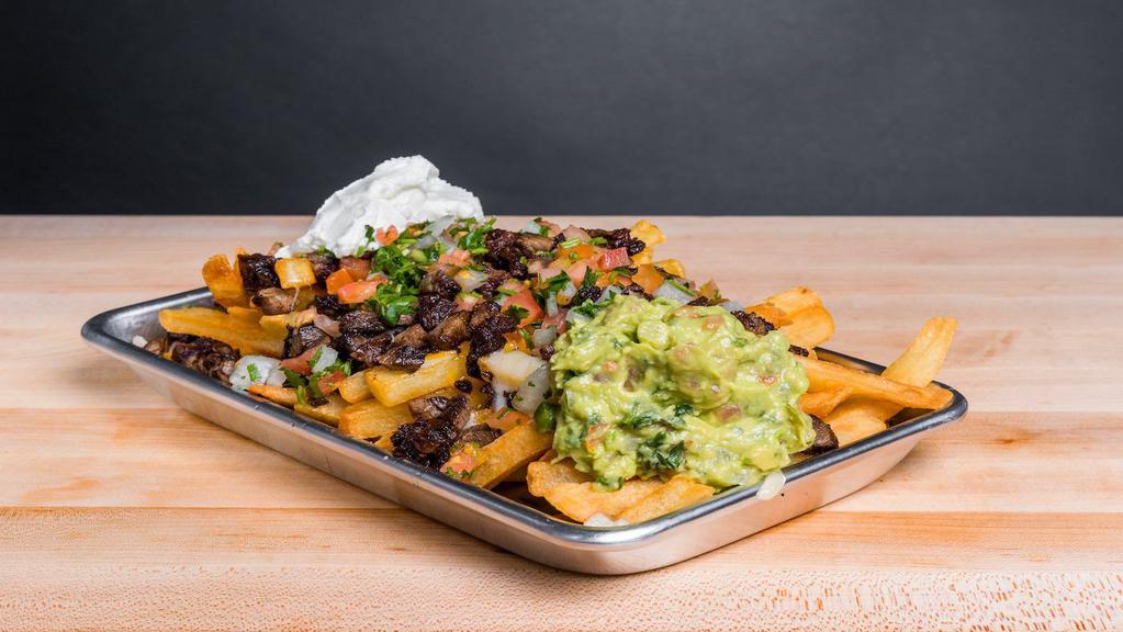 Carne Asada Fries · French fries with carne asada, cheddar and jack cheese, sour cream, guacamole and pico de gallo.