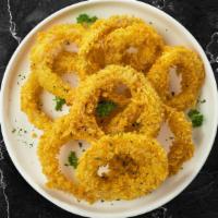 Sound Of Onion Rings · (Vegetarian) Sliced onions dipped in a light batter and fried until crispy and golden brown.