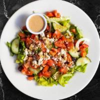 Grimmace Greek Salad · (Vegetarian) Romaine lettuce, cucumbers, tomatoes, red onions, olives, and feta cheese tosse...