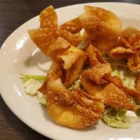 Fried Crab Cheese Wonton (8) · Imitation crab meat with cream cheese.