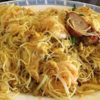 Singapore Style Rice Noodles · Mild Spice. Curry flavored rice noodles with pork, chicken, shrimp.