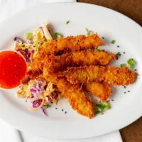 Crispy Coconut Shrimp · Five pieces of our house-made coconut shrimp over chipotle coleslaw served with a mango swee...