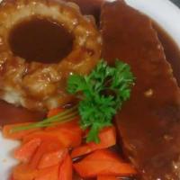 Meatloaf   After 11Am Mondays · Served with Mashed Potatoes and Gravy and Carrots and Soup or Salad