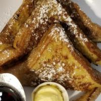 French Toast · 6 Halves of thick Egg Bread dipped in our Special Batter, dusted with Powdered Sugar.