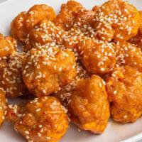Firecracker Shrimp · Lightly fried shrimp tossed in our sweet and spicy Firecracker sauce.  Finished with sesame ...