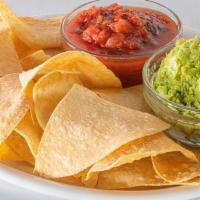 Chips, Salsa And Guac · The classic done right featuring crisp tortilla chips, salsa and fresh guacamole for dipping...