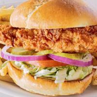 Fried Chicken Sandwich · Fresh hand-breaded chicken breast served with lettuce, tomato, red onions, pickles, and mayo...