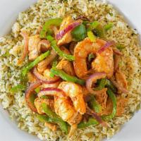 Calypso Seafood Rice Bowl · Cajun seasoned shrimp and mahi mahi sauteed with onions, peppers and garlic ginger sauce.  S...