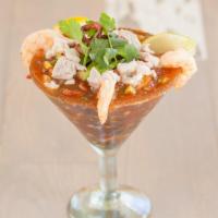 Campechana Cocktail(14 Oz) · Ceviche, shrimp, and octopus with your choice of red or green with shrimp broth, tomato, cuc...