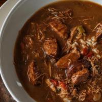 Gumbo · BJ fine gumbo - one quart of shredded chicken and crabmeat bisque with chicken andouille sau...