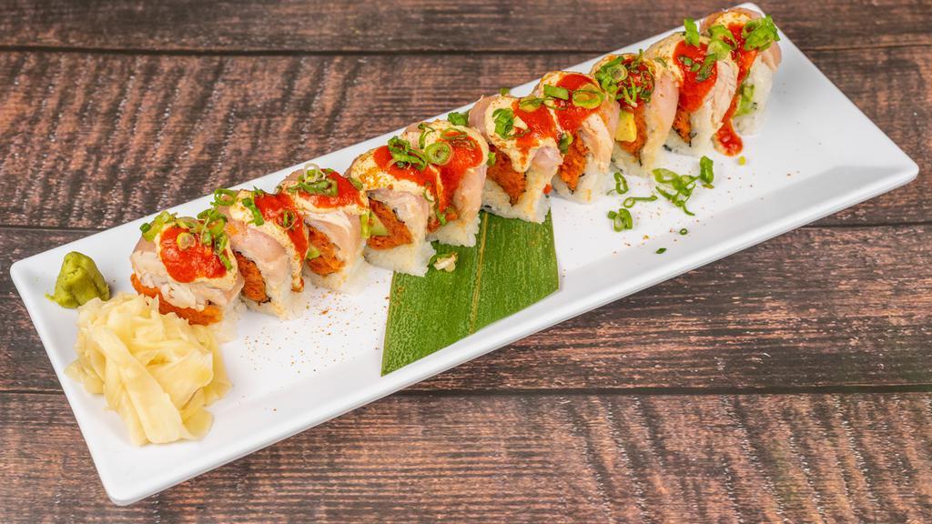 Albacore Dream Roll · 10 pieces. Spicy tuna and avocado inside, albacore on top with scallion. Maruya special sauce on top with garlic chip.