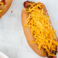 Chili Cheez Dog · Hot dogs are a 1/3 lb. of 100% all natural beef served on a hot dog bun. Topped with 100% al...